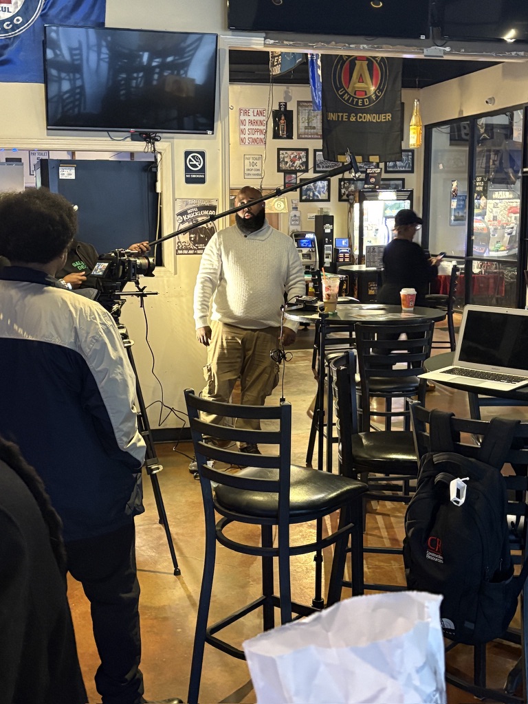 Camera and sound crew filming a scene